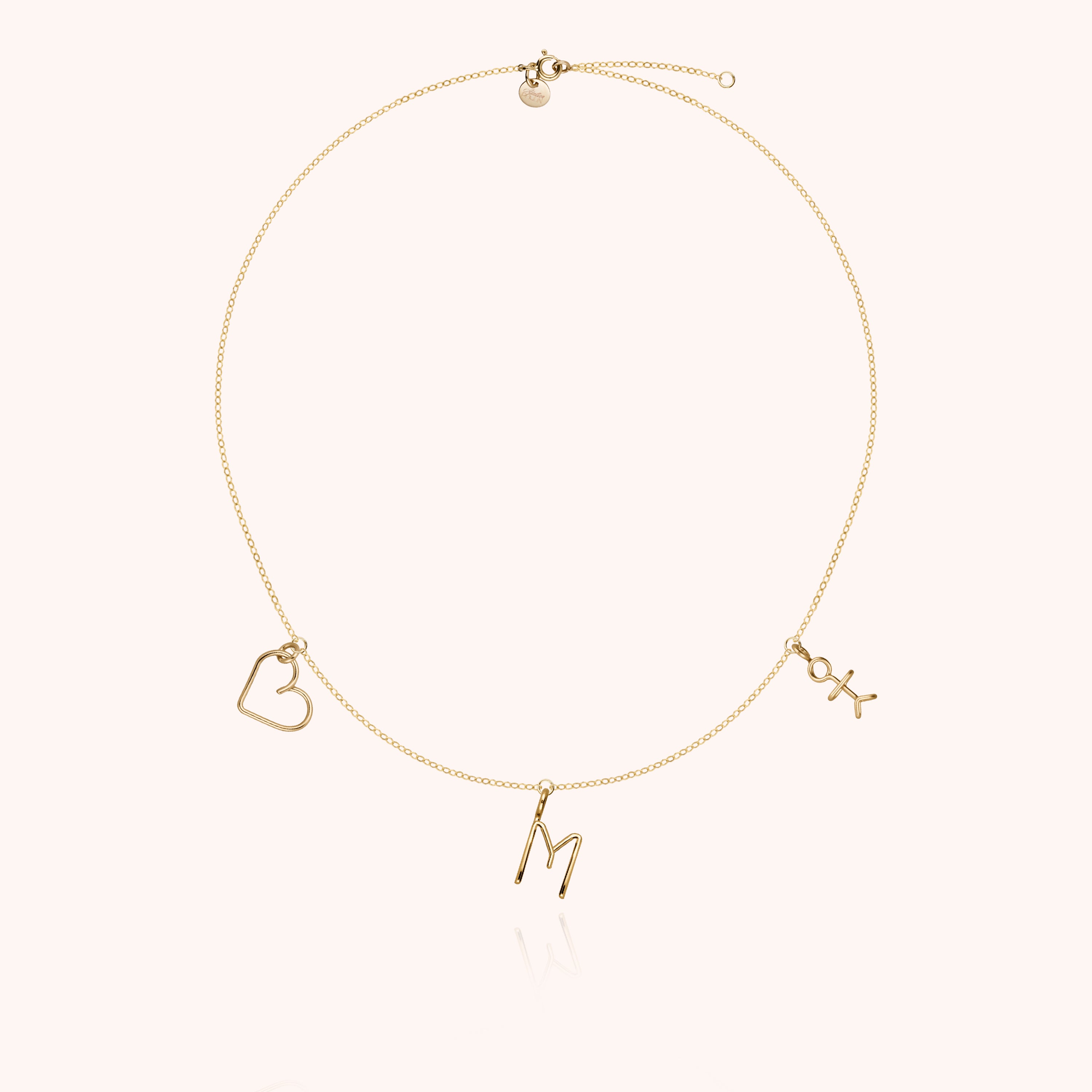 Collana Charms Trio Family - oro giallo laminato