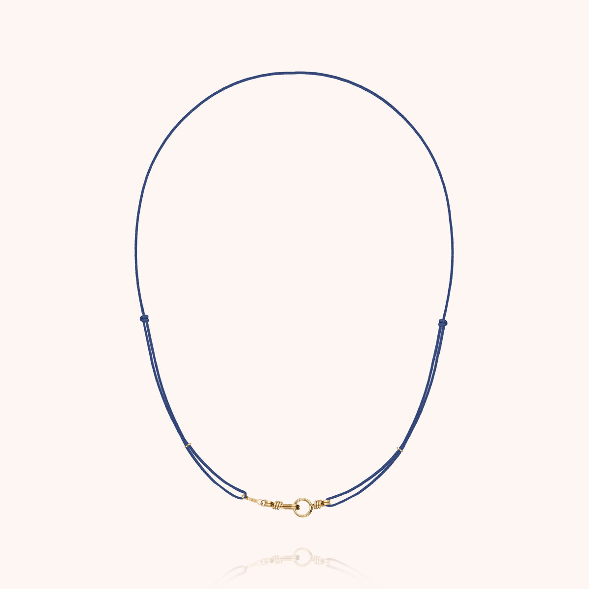 Slim Knot Cord Necklace Attache moi in 14k yellow gold-filled wire, mineral blue cord