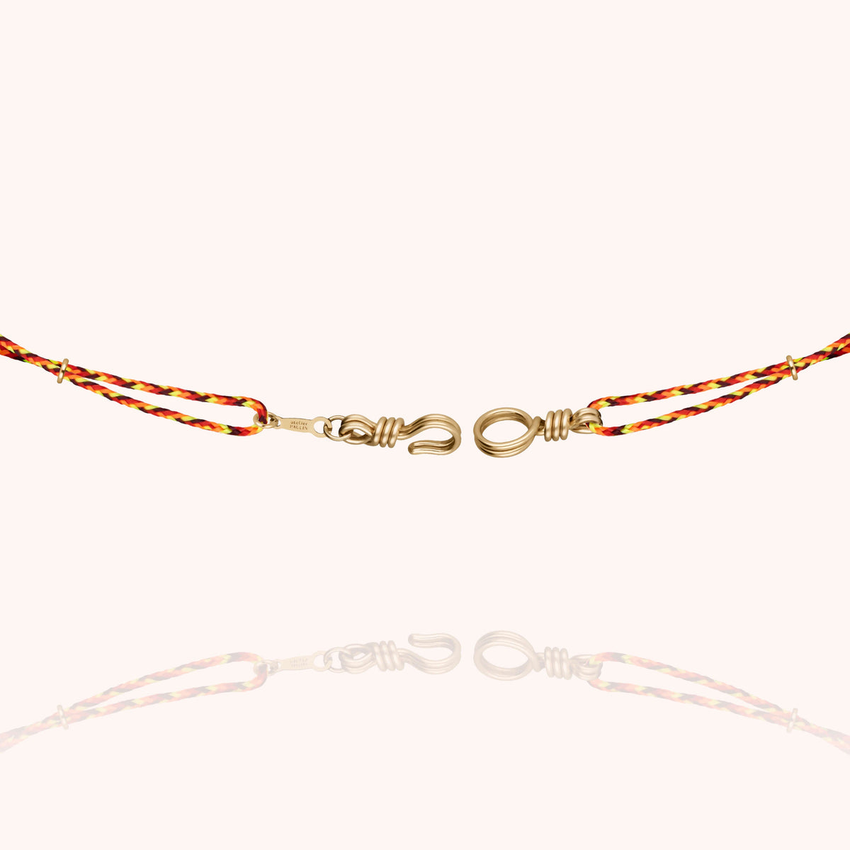 Slim Knot Cord Necklace Attache moi, worn around the neck