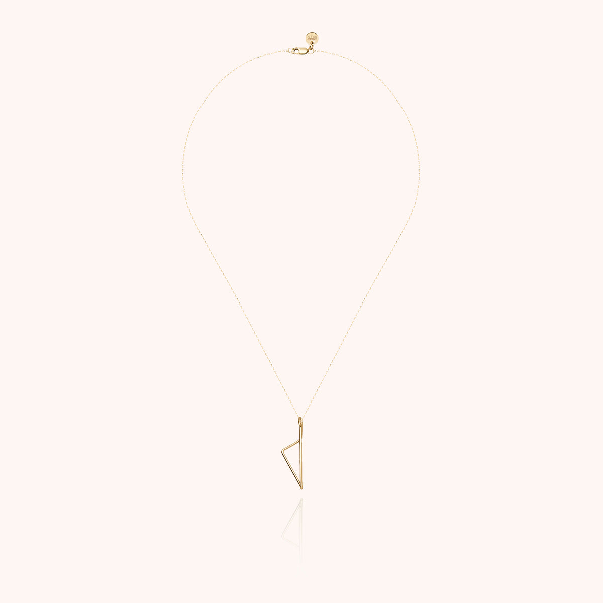 Collana Corsica in filo d'oro giallo laminato 14k, portata al collo