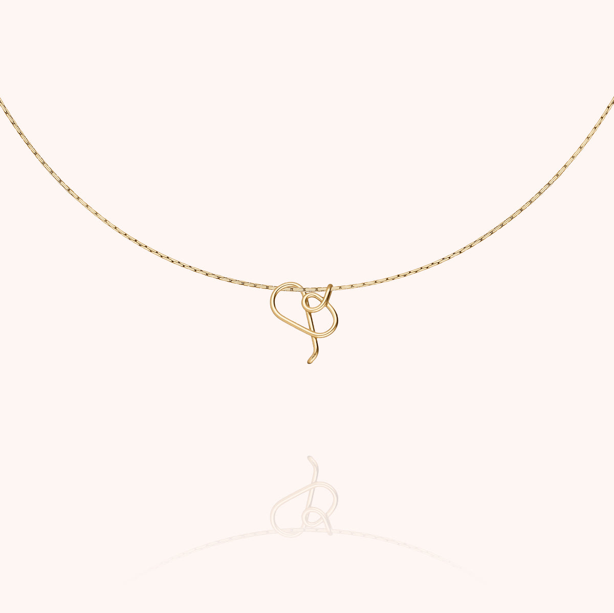 Close-up of the clasp on the Original Initiale Necklace in 14k yellow gold-filled wire
