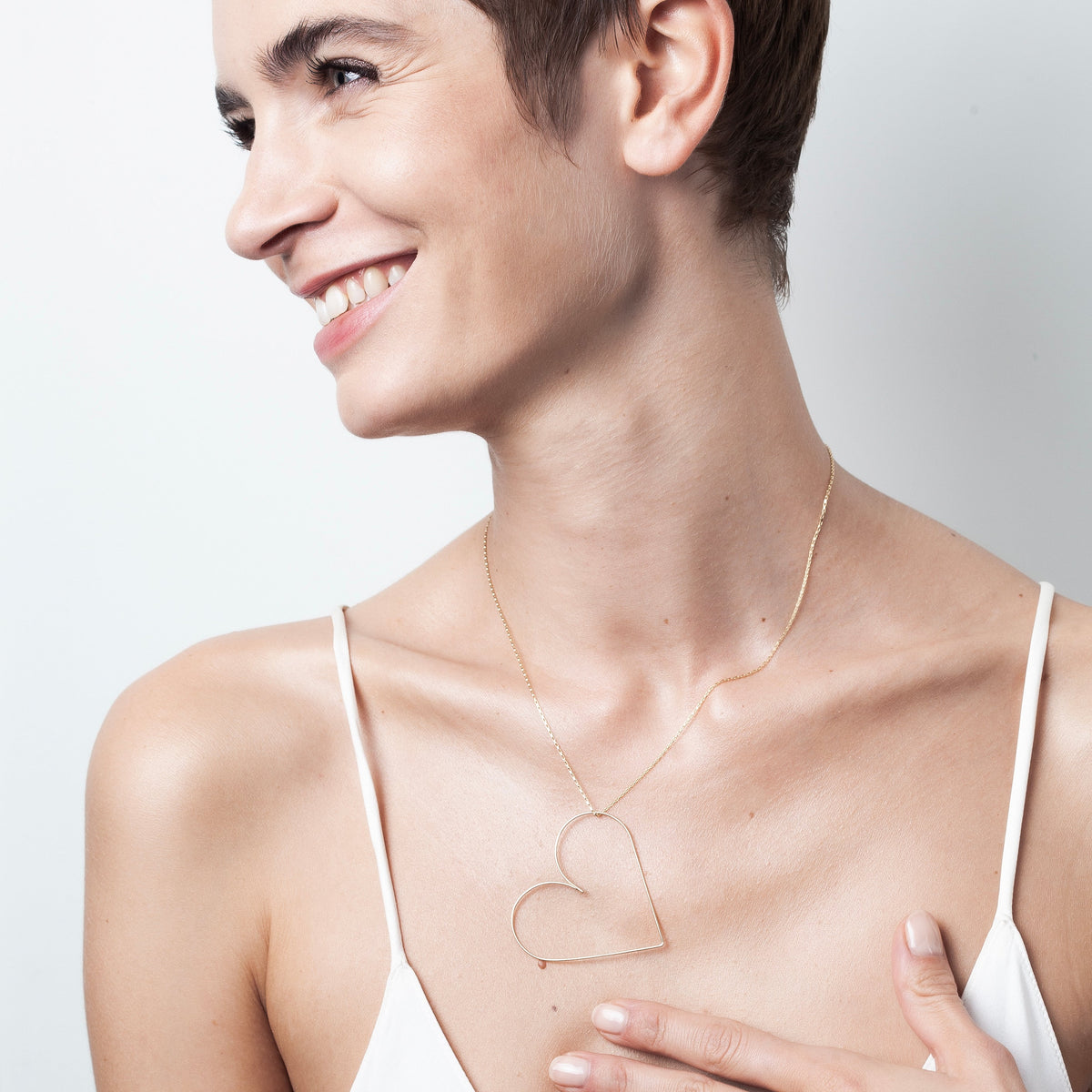 Collana Piccolo Cuore in filo d'oro giallo laminato 14k