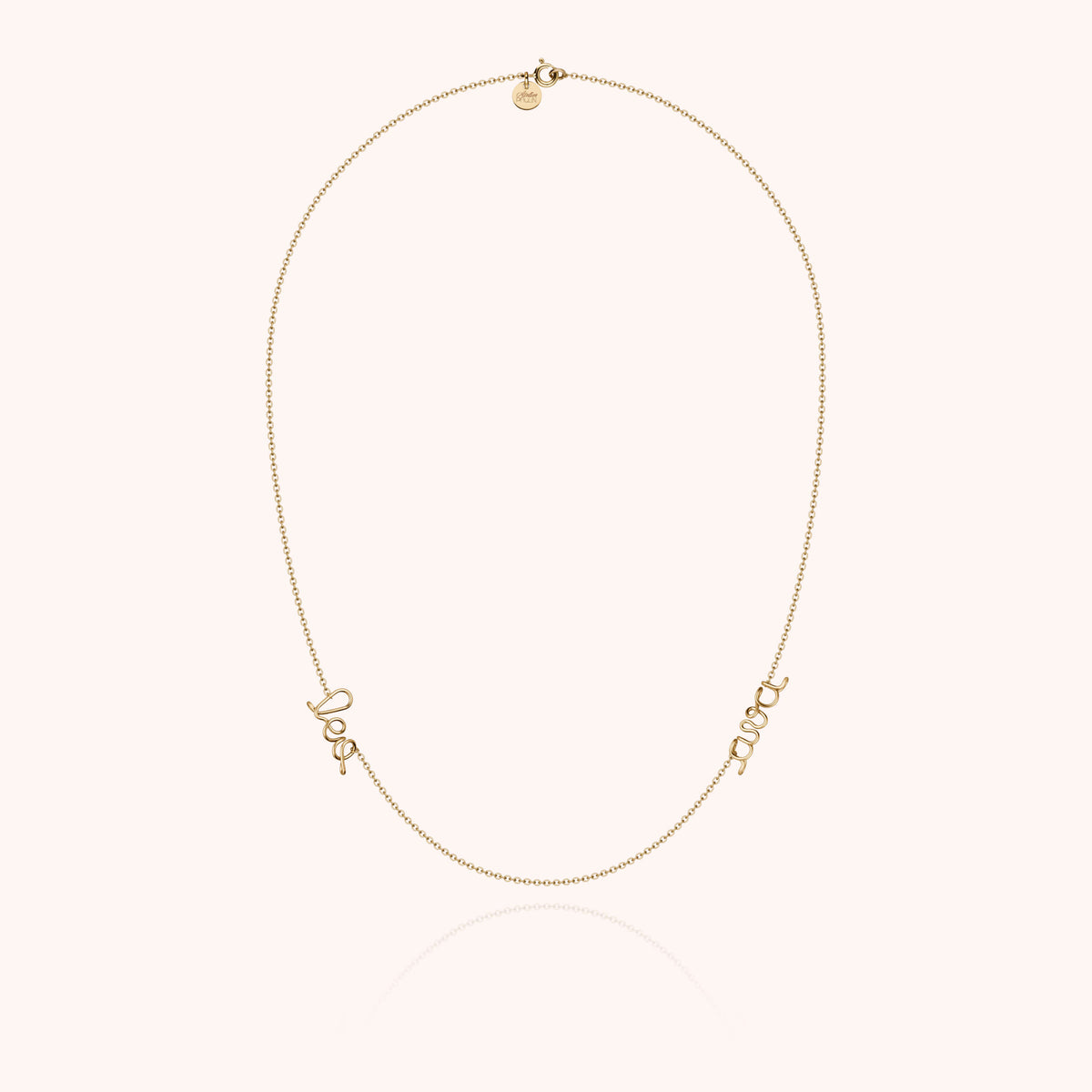 Personalized Richelieu Duo Necklace in 14k yellow gold-filled wire, worn on the wrist