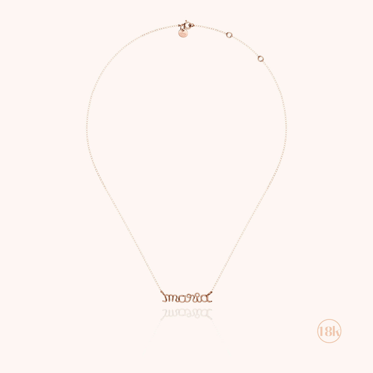Close-up of the 18k rose gold wire on the Personalized Richelieu Necklace