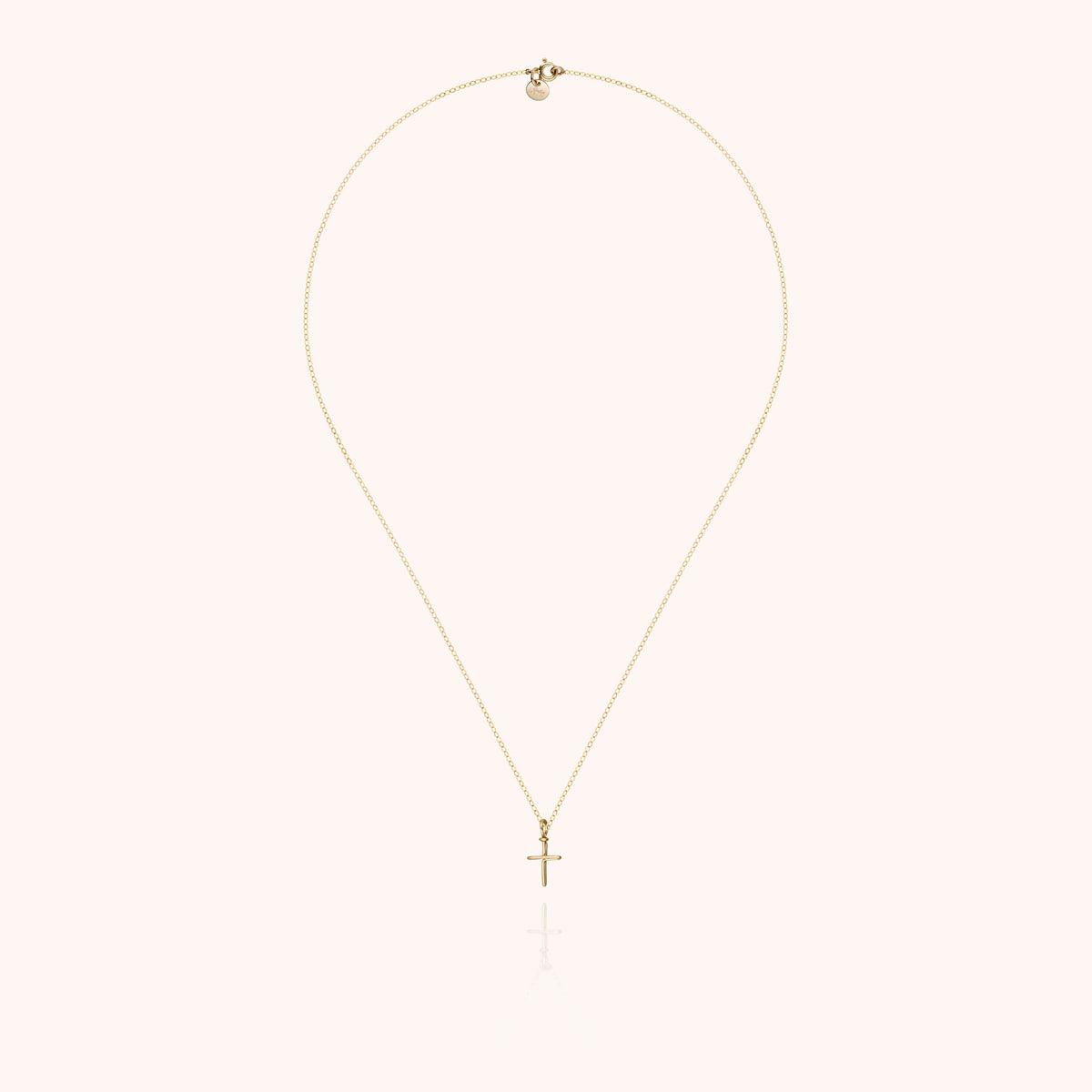 Symbolic Cross Charms Necklace in 14k yellow gold-filled wire, worn around the neck