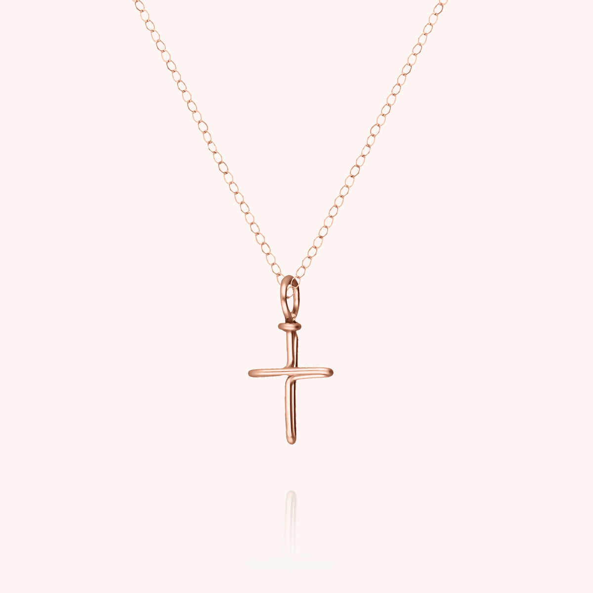 Collier Charms Symbolic Croix en or rose laminé, vue principale du pendentif