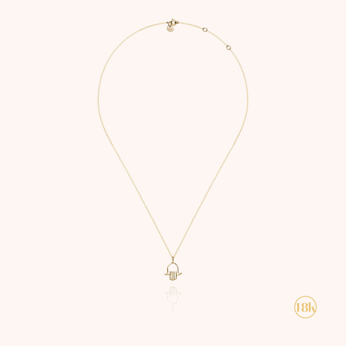 Symbolic Hand of Fatima Charms Necklace with its gold charm, worn around the neck