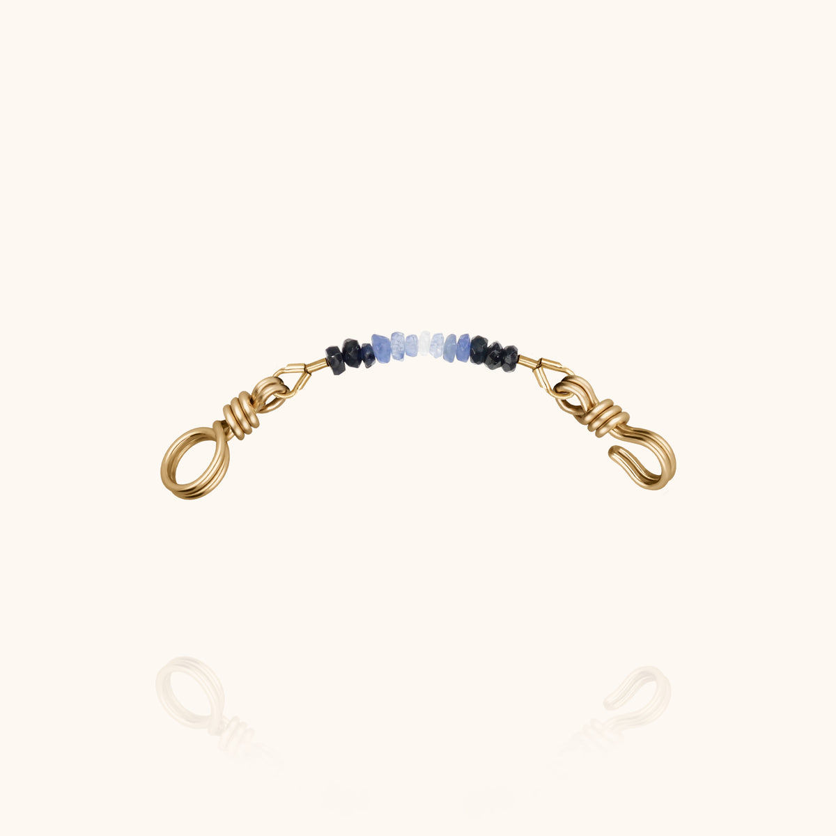 Modulo Nonza Attache moi in filo d'oro giallo laminato 14k, sfumatura di perle di zaffiro blu